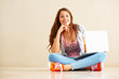 Beautiful woman sitting with laptop