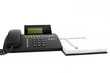 Telephone with note pad and pencil
