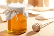 Honey with wood stick