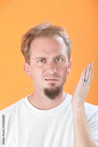 Photo: Man Gestures a Slap Man Gestures a Slap
