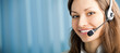 Portrait of happy smiling support phone operator in headset