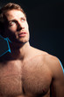 Portrait of handsome caucasian young man on black background