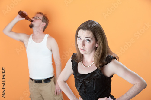 Photo: Unhappy Wife with Drunk Husband Unhappy Wife with Drunk Husband