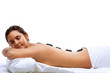 pretty woman receiving a therapy with hot stones pretty woman receiving a therapy with hot stones