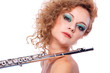 Portrait of a woman playing flute Portrait of a woman playing flute
