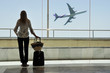 Girl at the airport window