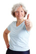 Sportliche Seniorin hält Daumen hoch Sportliche Seniorin hält Daumen hoch