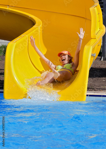 Photo: Girl on a waterslide Girl on a waterslide