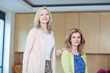 Photo: Smiling woman with adult daughter Smiling woman with adult daughter