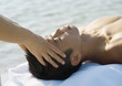Man receiving head massage