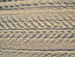 Reifenspur im Sand