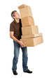 Photo: Delivery man balancing stack of boxes Delivery man balancing stack of boxes