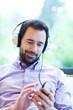 Man listening to music with MP3 player