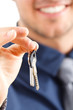 Businessman giving keys