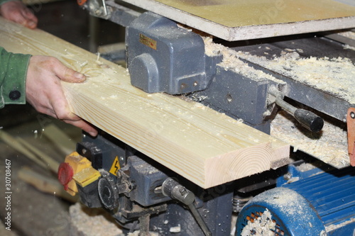 Photo: Work on the joiner's machine tool Work on the joiner's machine tool