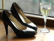 Female Shoes and Glass of Wine