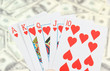 Cards on money background close up