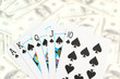 Cards on money background close up