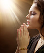 Portrait of a girl praying