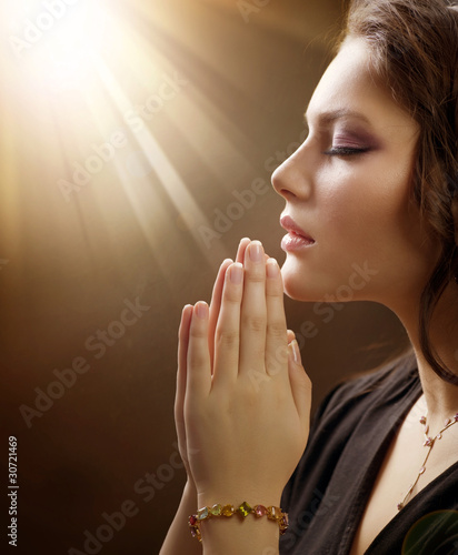 Photo: Portrait of a girl praying Portrait of a girl praying