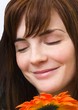 Photo: Woman Enjoying Smell Of Flower Woman Enjoying Smell Of Flower