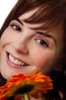 Photo: Woman Smiling With Flower Woman Smiling With Flower