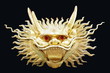 Gold chinese dragon head with black background Gold chinese dragon head with black background