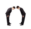 Two asian businessman with bow