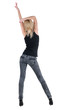 Young woman dancing. Rear view. Young woman dancing. Rear view.