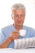 man read the newspaper