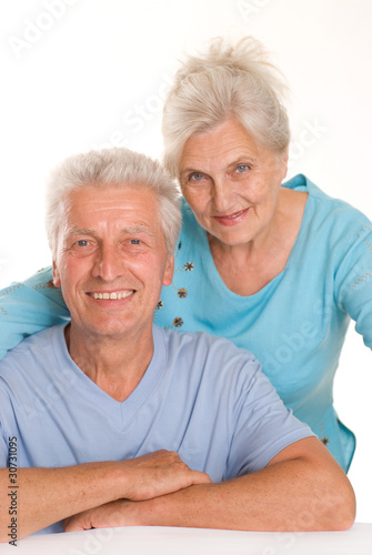 Photo: elderly couple on a white elderly couple on a white