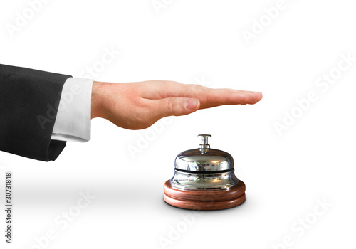 Photo: hand ringing the bell hand ringing the bell