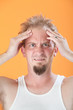 Man Holds His Head