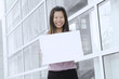 asian business women with blank cardboard