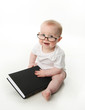 Baby reading wearing glasses
