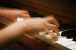 A Person Playing The Piano