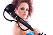 Attractive violinist playing the electric violin Attractive violinist playing the electric violin