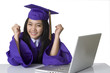 Photo: Successful Asian Graduate student sitting at desk Successful Asian Graduate student sitting at desk