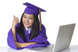 Photo: Graduate student sitting with computer Graduate student sitting with computer