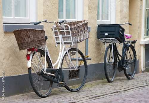 Photo: two bicycles with baskets two bicycles with baskets