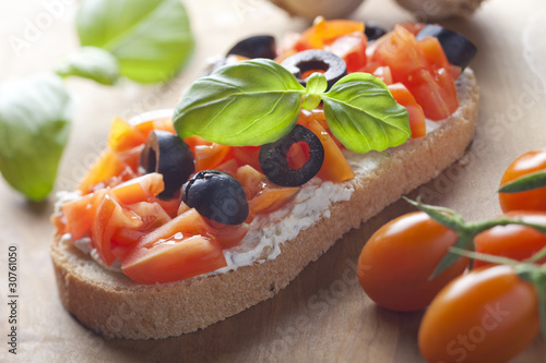 Photo: Bruschetta Appetizer Close Up. Shallow depth of field. Bruschetta Appetizer Close Up. Shallow depth of field.