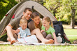 Photo: Family camping in the park Family camping in the park