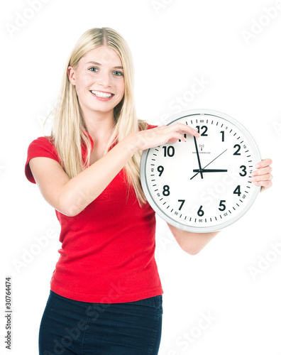 Photo: Young beautiful woman with the clock Young beautiful woman with the clock
