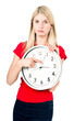 Cute blonde girl with the clock