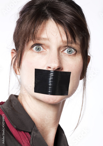 Photo: silence de femme d'affaires baillonnée silence de femme d'affaires baillonnée