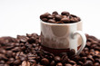 Cup and roasted coffeee beans