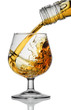 cognac being poured into a glass