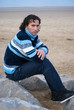 Man sitting on the rocks Man sitting on the rocks