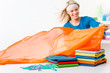 Laundry - woman folding clothes Laundry - woman folding clothes