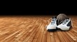 Basketball shoes and ball on the court Basketball shoes and ball on the court